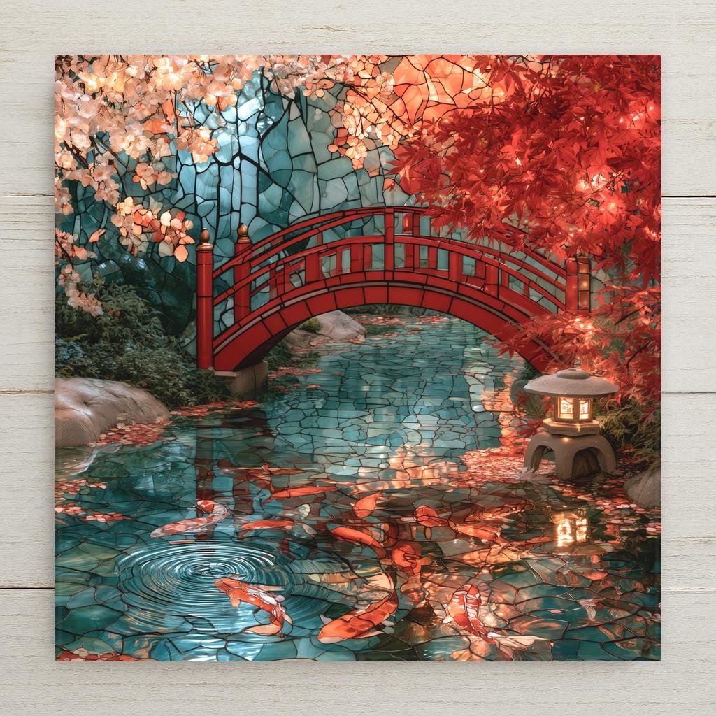 Stained glass style ceramic art tile of a red arched bridge over a teal koi pond, with orange and white koi, crimson Japanese maple leaves, cherry blossoms, and a glowing stone lantern.